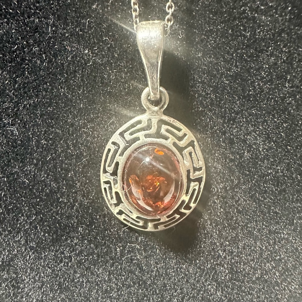 Sterling silver necklace with amber pendant on 16 inch chain